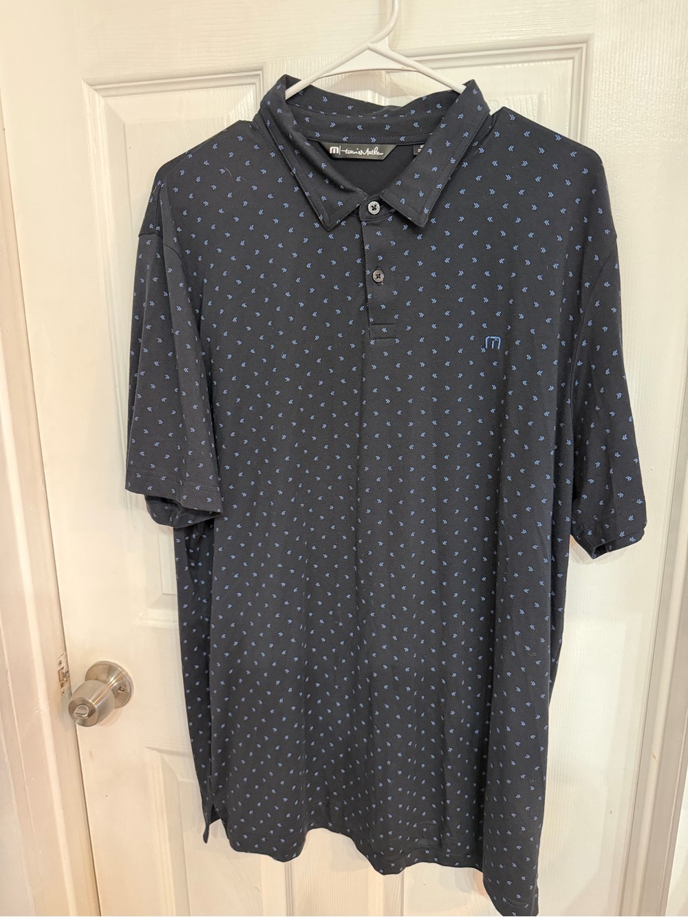 Travis Mathew Black Polo with Blue Micro Arrow Print
